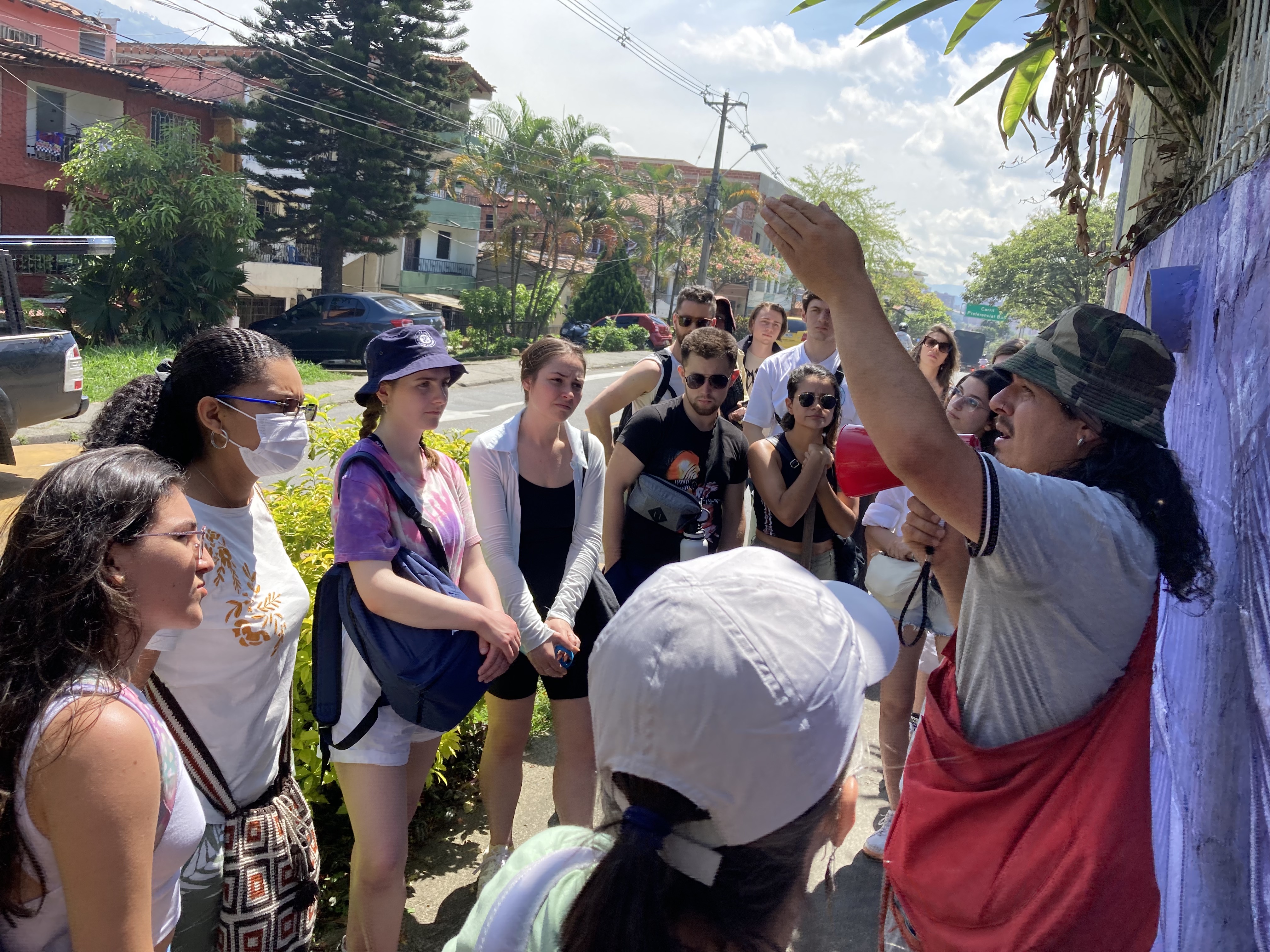 A group of students in a graffiti guide tour